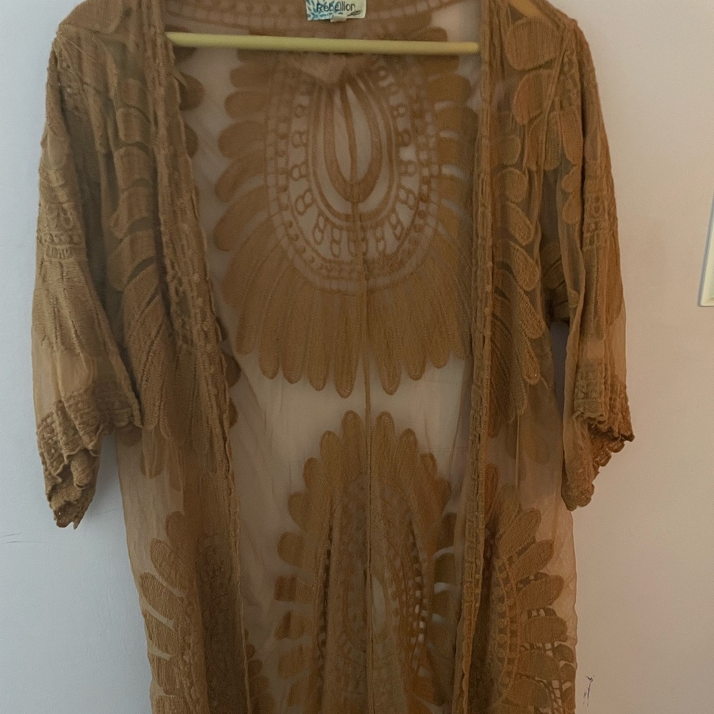 Brown sweater perfect for nice fall/spring weather with a pair of jeans